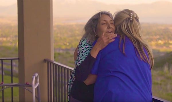 Danville Support Services staff hugging elderly lady